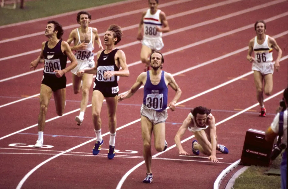 Finnish runner, Lasse Viren, winning a track race.